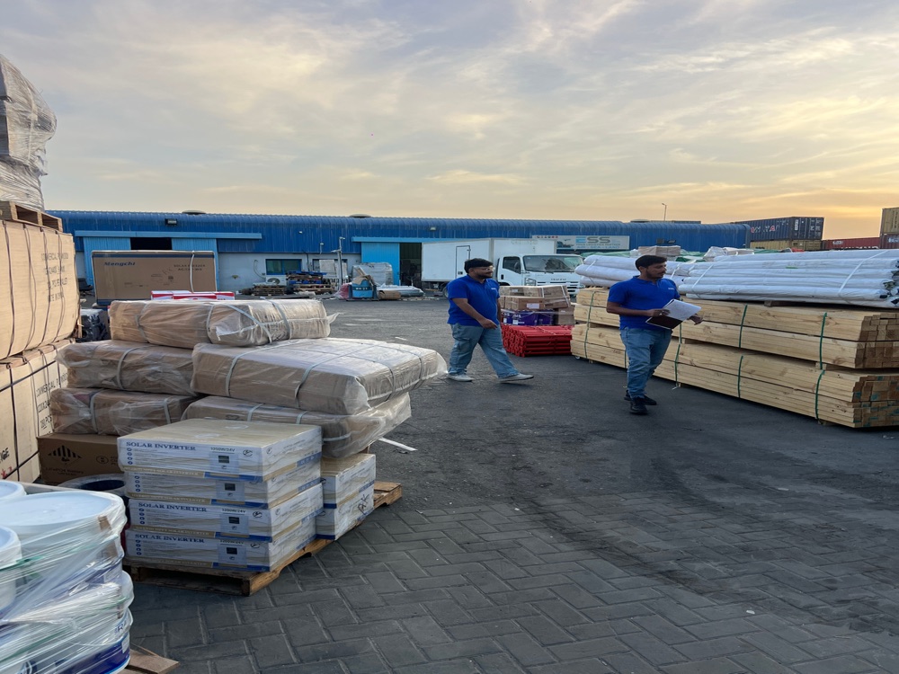 ESS staff consolidating and labelling cargo